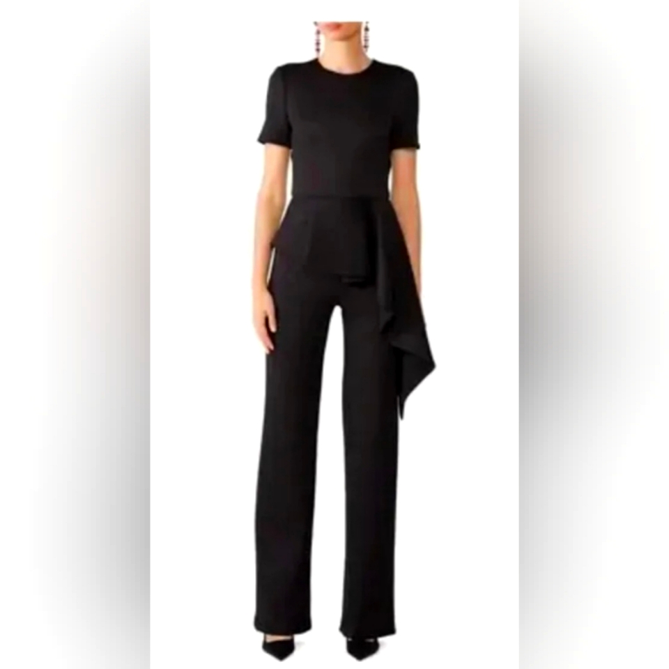 Womens Designer Jumpsuit With Ruffle Overhang.